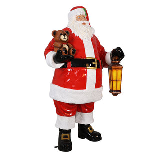 Santa Claus Holding Bear And Lantern